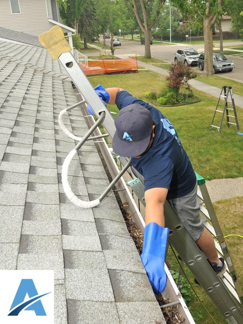 Ascend employee gutter cleaning Ascend Cleaning Services Inc.