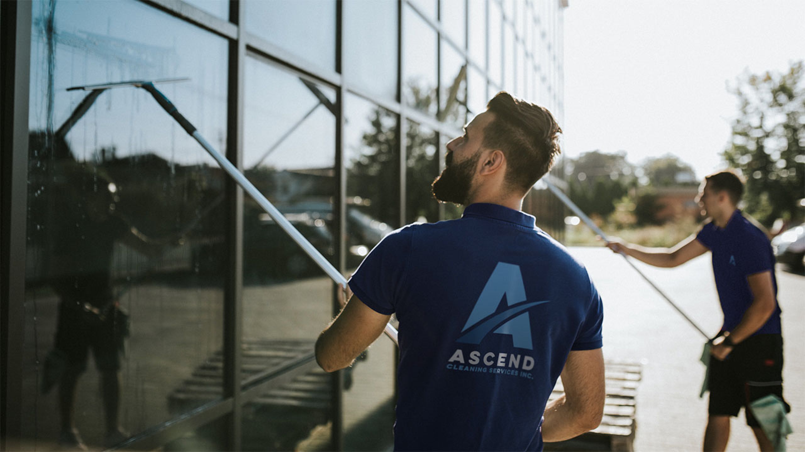 Ascend window cleaning team cleaning windows on building Ascend Cleaning Services Inc.