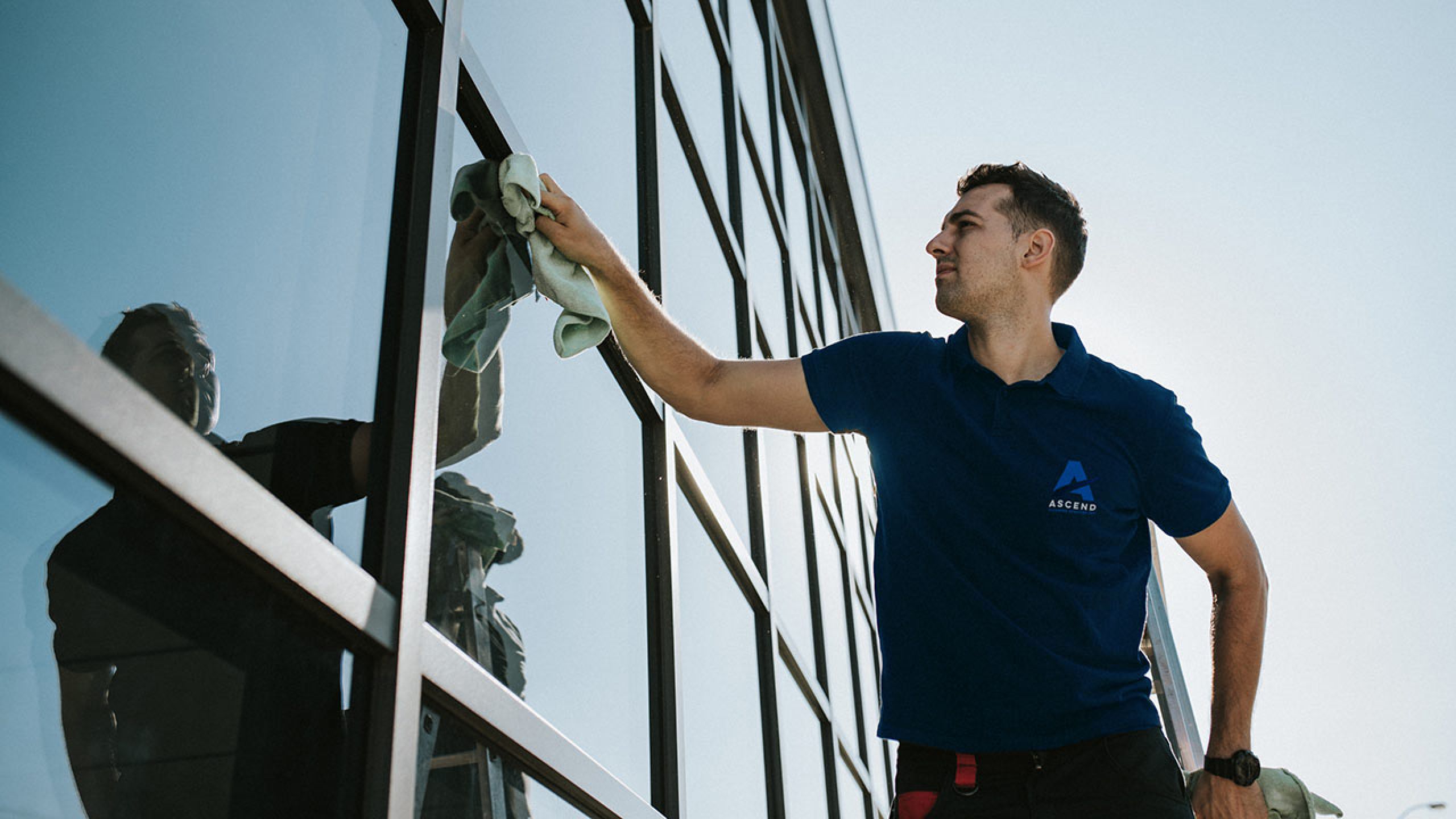 Ascend window cleaning team cleaning windows on building Ascend Cleaning Services Inc.