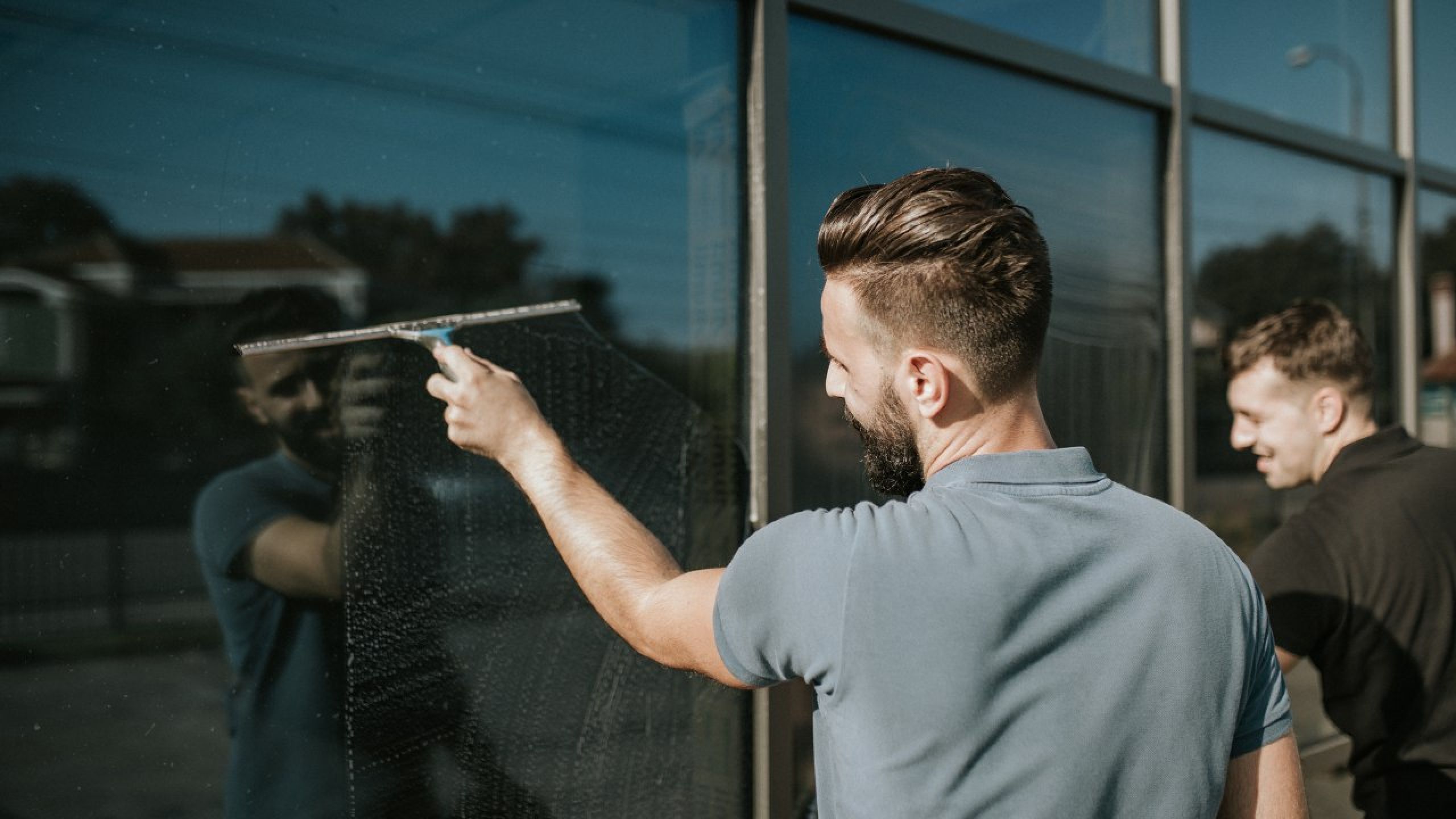 Ascend window cleaning team cleaning windows on building Ascend Cleaning Services Inc.