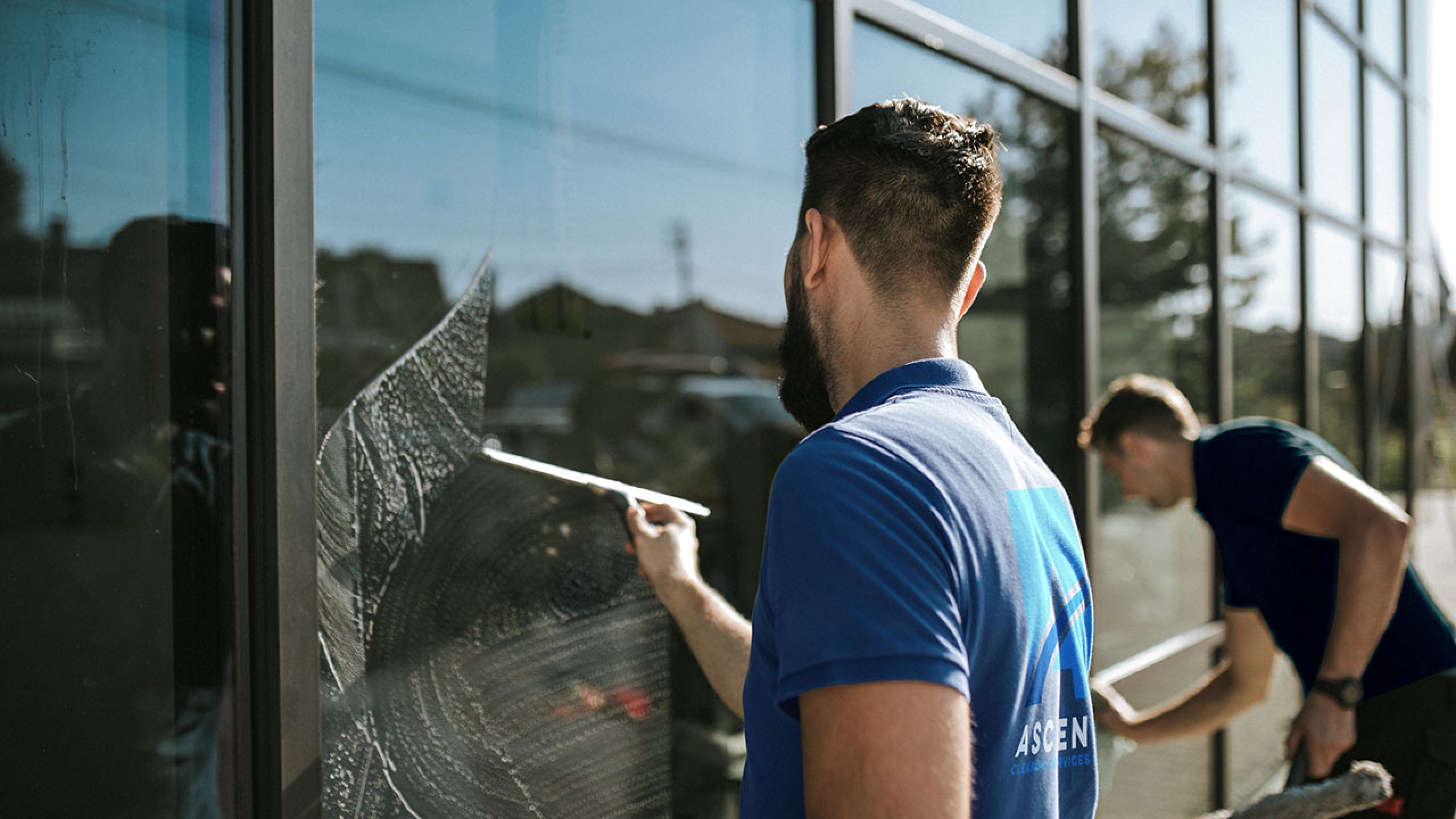 Ascend employees window washing Ascend Cleaning Services Inc.